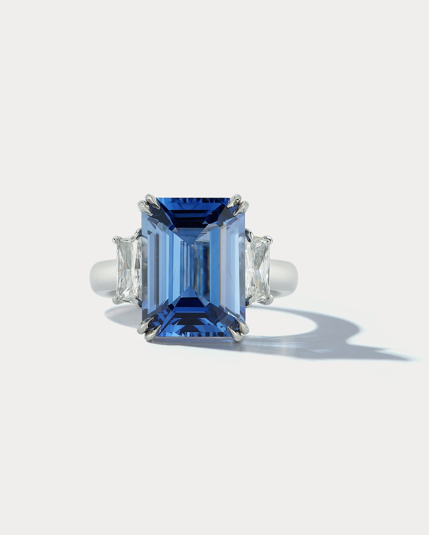 6.93 carat Emerald-cut Sapphire Center Stone Three Stone Ring - Ammrada