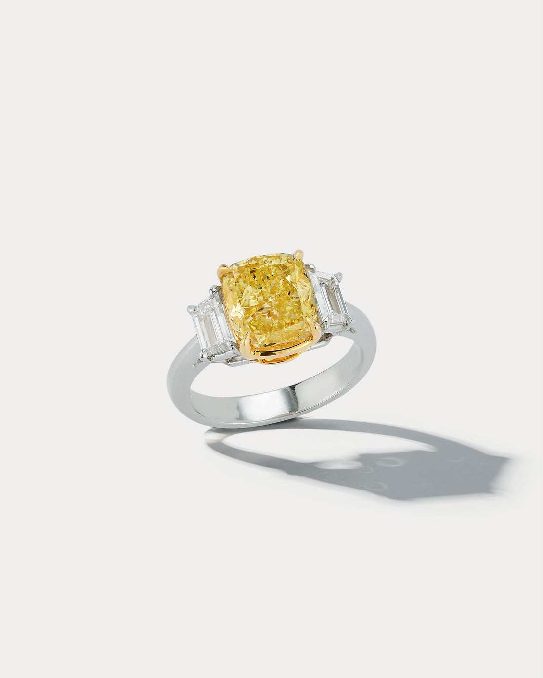 4.01 carat Fancy Intense Yellow Cushion-cut Center Stone Three-stone Ring - Ammrada